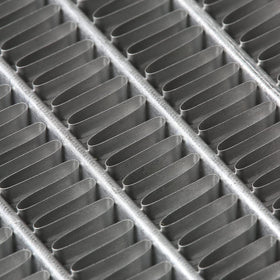DNA MOTORING radiator installed in a Civic showing direct-fit convenience