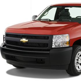 DNA MOTORING daytime lifestyle shot of Silverado with new headlights for refreshed appearance
