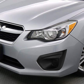 DNA MOTORING fog lights in night driving scene showing clearer roadway and safer visibility
