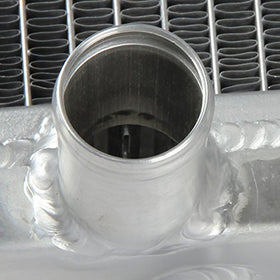 DNA MOTORING side profile illustrating 1.5-inch core thickness for extra cooling