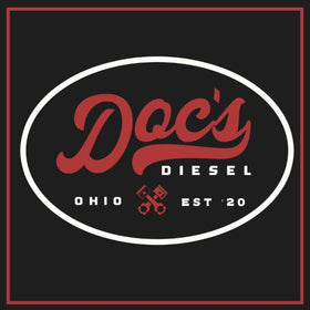 Doc's Diesel lifestyle truck on road implying dependable filtration for heavy use benefit