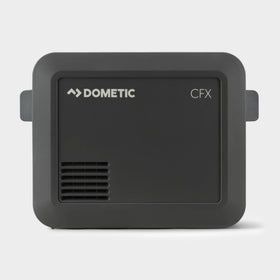 Dometic CFX5 25L next to stacked cans showing 25L capacity and packing benefit