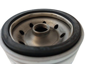 Donaldson P550943 filter media closeup showing dense multi-layer capture