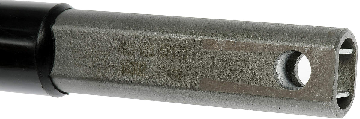 Dorman steering shaft next to ruler showing scale and proper sizing for fit confirmation