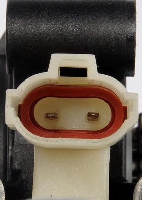 Dorman motor next to ruler showing scale for correct fitment benefit