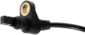 Dorman ABS sensor installed on wheel hub demonstrating proper routing and secure fitment