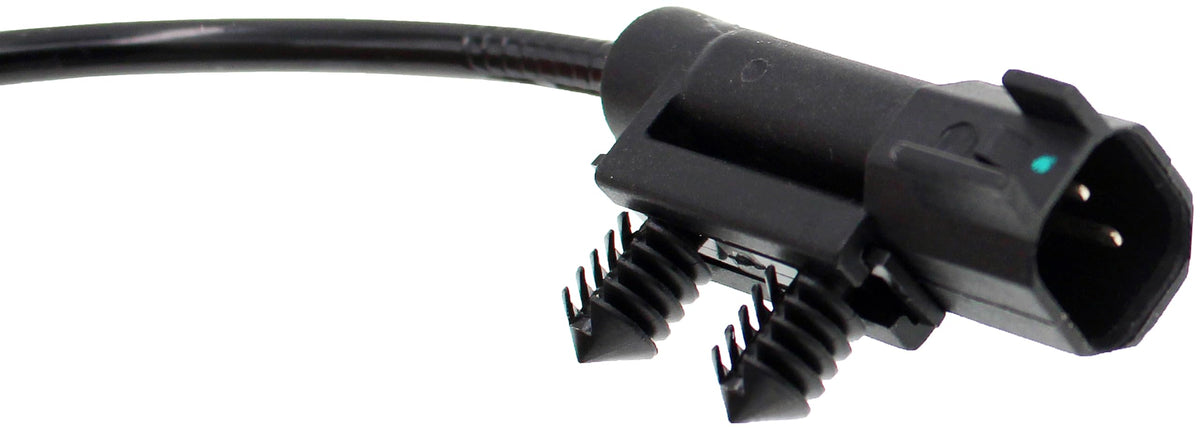 Dorman ABS sensor next to ruler for scale showing compact design and straightforward installation