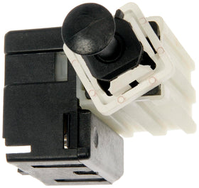Dorman brake light switch installed under dash demonstrating easy replacement benefit