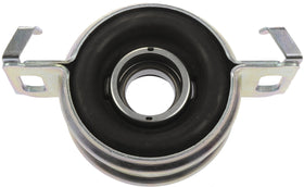 Dorman center support bearing installed on driveshaft in garage highlighting restored driveline stability