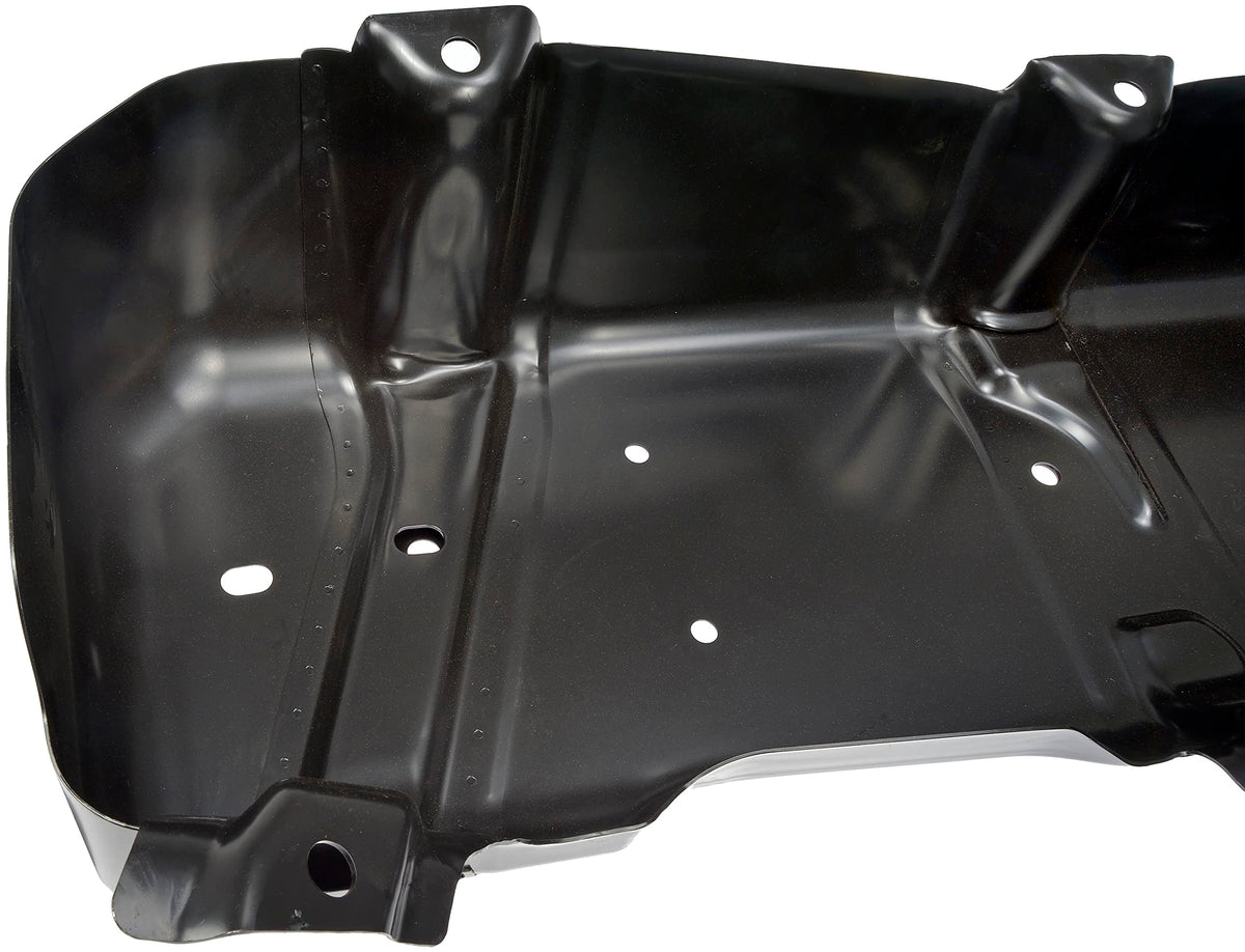 Dorman fuel tank skid plate beside ruler showing dimensions for fitment