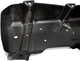 Dorman fuel tank skid plate beside ruler showing dimensions for fitment