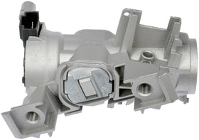 Dorman ignition lock housing in hand for scale illustrating compact OEM-like size