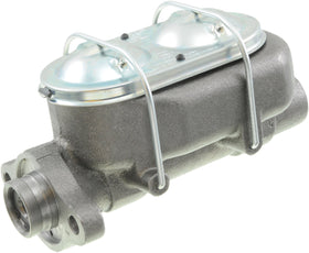 Dorman master cylinder beside ruler for scale showing precise dimensions