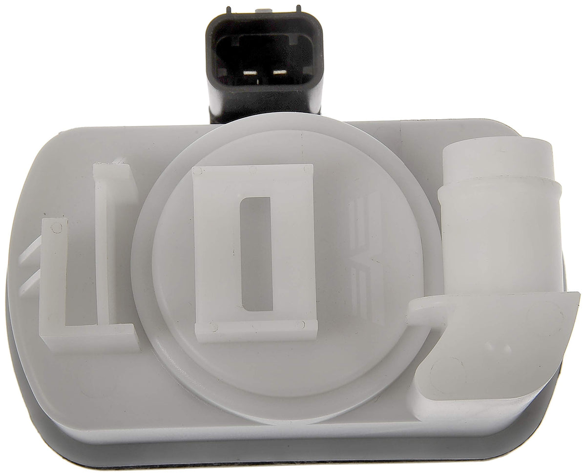 Dorman pump next to ruler showing compact size and simple installation