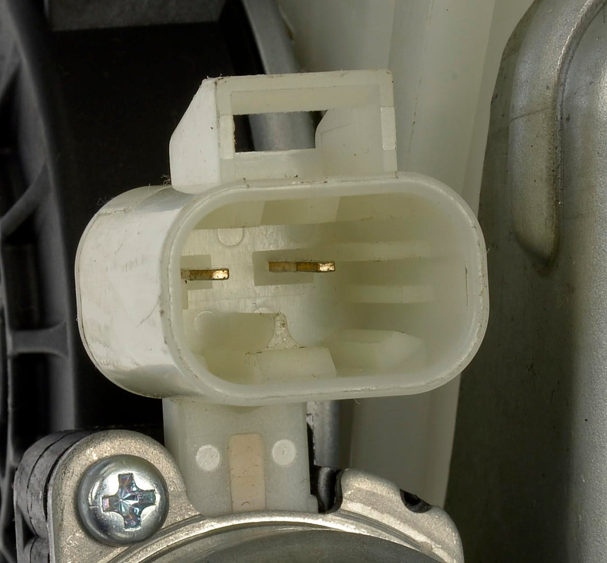 Dorman regulator size comparison with ruler showing compact fit for correct installation
