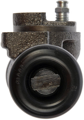Dorman wheel cylinder beside ruler illustrating compact size and fit accuracy