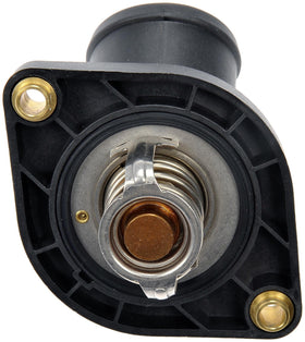 Dorman thermostat housing installed underhood demonstrating correct OEM alignment