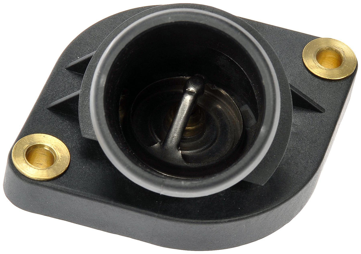 Dorman thermostat housing next to ruler showing scale and easy fit verification
