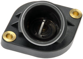 Dorman thermostat housing next to ruler showing scale and easy fit verification
