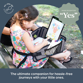 Dreambaby folded flat for packing into luggage or under airplane seat