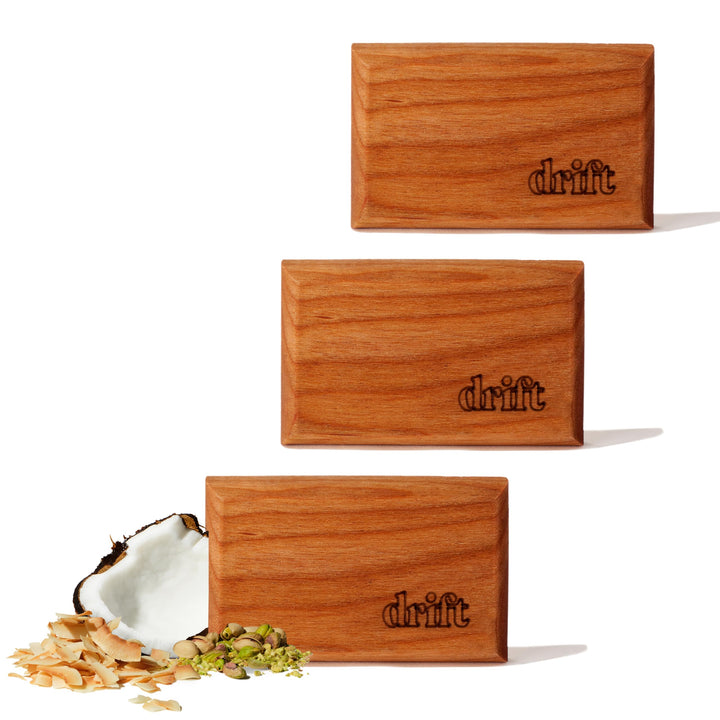 drift front packaging showing three coconut pistachio refill blocks and benefit of long-lasting scent