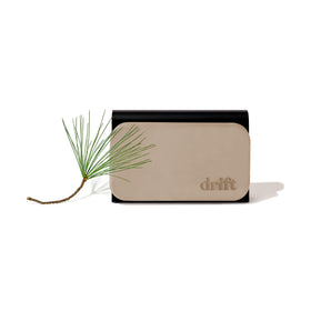 drift front packaging showing pine scent and refillable design benefit
