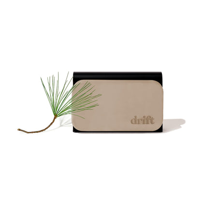 drift front packaging showing pine scent and refillable design benefit