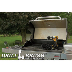 Drillbrush attachment mounted on drill cleaning a barbecue grate efficiently