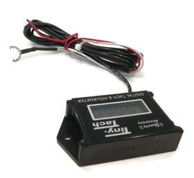 DTI Tiny Tach TT2B next to a tape measure showing compact size for tight spaces