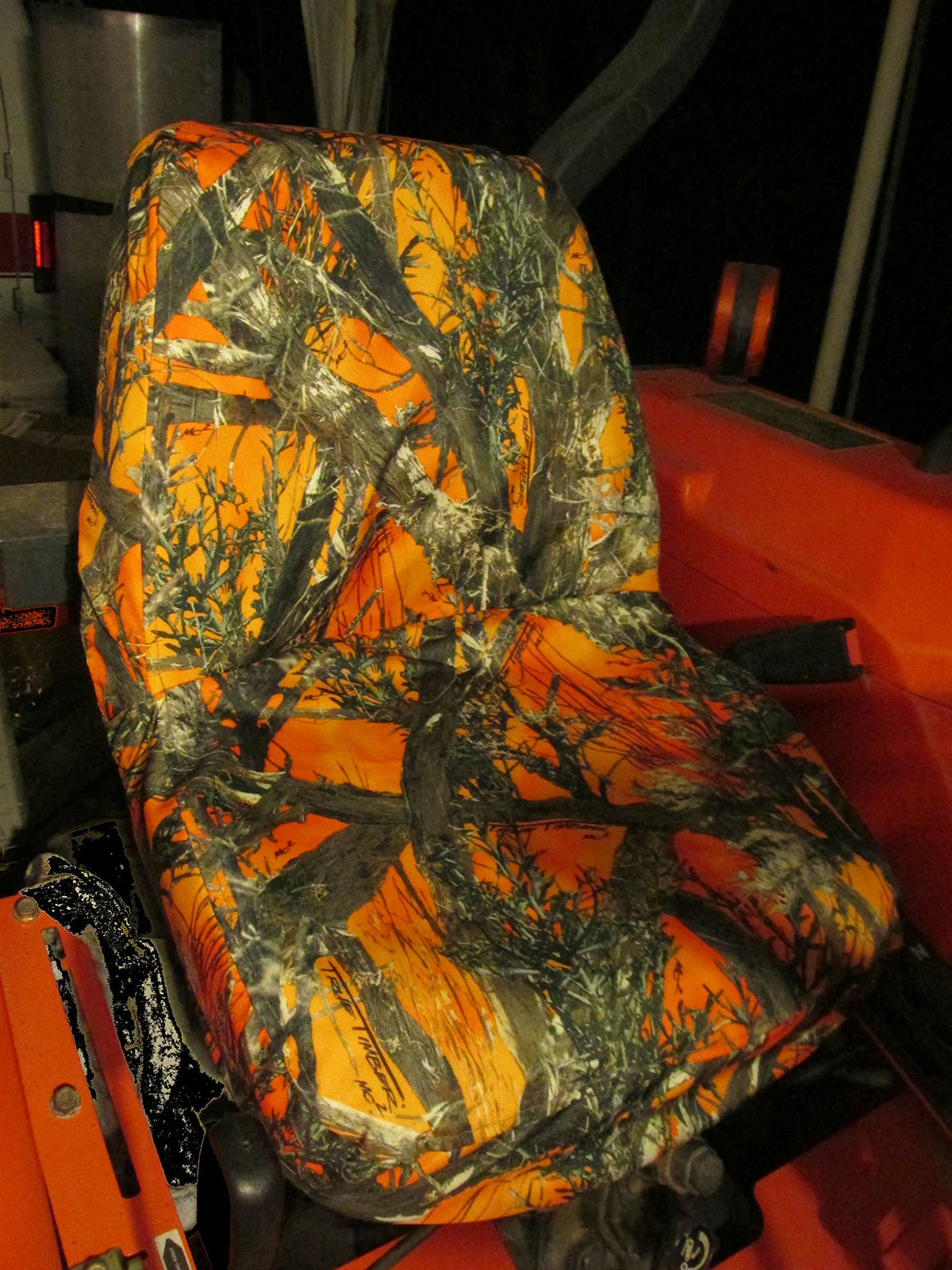 Durafit Seat Covers installed on a Kubota tractor showing protection and comfortable use outdoors