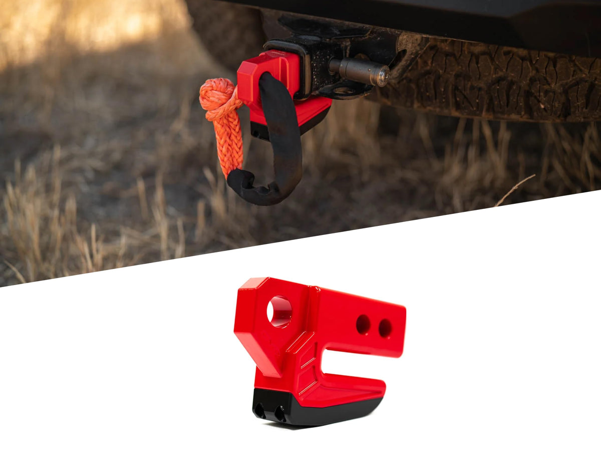 DV8 Offroad front view of red hitch skid plate showing bumper protection