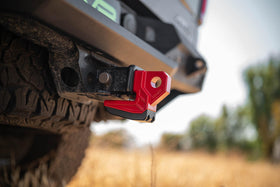 DV8 Offroad side profile of hitch skid plate highlighting low-scrape design