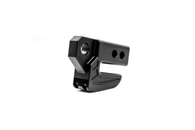 DV8 Offroad next to hitch pin for scale showing compact heavy-duty thickness