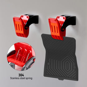 DWSFADA holding a heavy car mat showing secure support during washing
