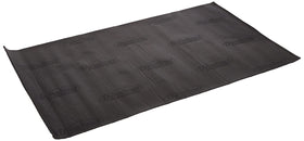 Dynamat Dynaliner installed on car floor reducing noise and insulating cabin temperature