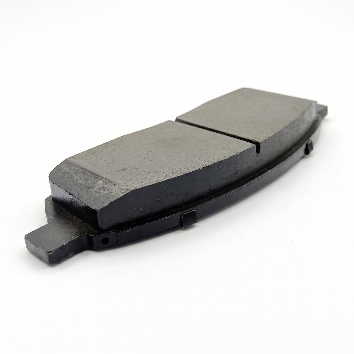 DYZJKWJW pad profile close-up highlighting ceramic compound edge and consistent thickness for durability
