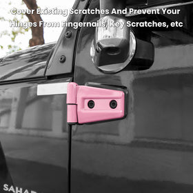 E-cowlboy lifestyle shot of Jeep parked with pink trims adding personalized style
