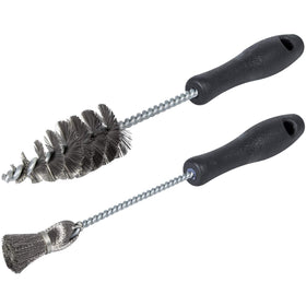 E-cowlboy brushes staged on a service bench illustrating professional maintenance use