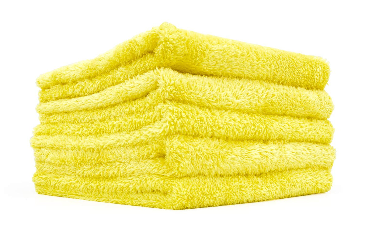 The Rag Company towel pack front view showing yellow edgeless towels and branding benefit: professional finish