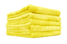 The Rag Company towel pack front view showing yellow edgeless towels and branding benefit: professional finish