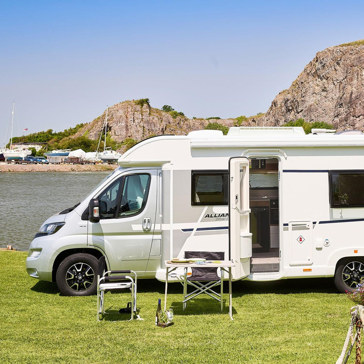 Earthtec 65528 on RV at campground showing durability and weather protection