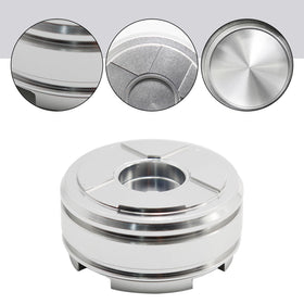 EATAKWARD pistons next to ruler for size reference and installation accuracy
