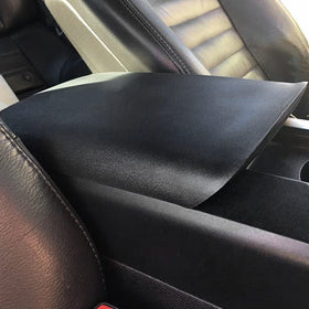 ECOTRIC armrest in a driving scene illustrating improved comfort for longer trips