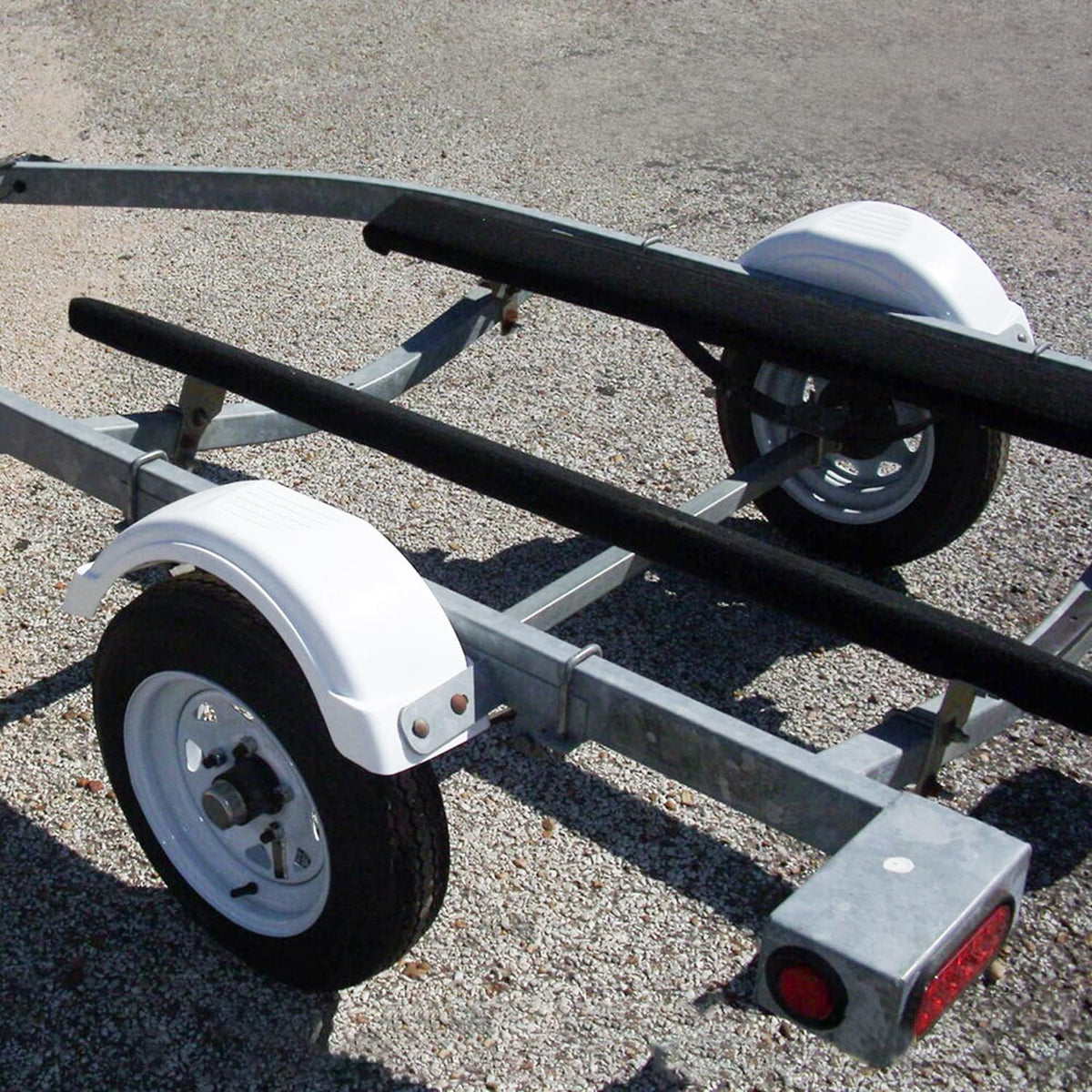 ECOTRIC fender deflecting rocks and debris showing trailer protection benefit
