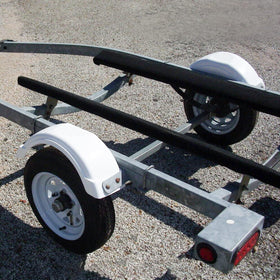 ECOTRIC fender deflecting rocks and debris showing trailer protection benefit