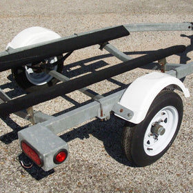 ECOTRIC fender installed on trailer side view demonstrating full wheel coverage
