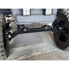 ECOTRIC lift kit installed on EZGO front, improved ground clearance visible