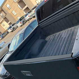 ECOTRIC tailgate cap side profile highlighting OEM-fit contour and sleek finish
