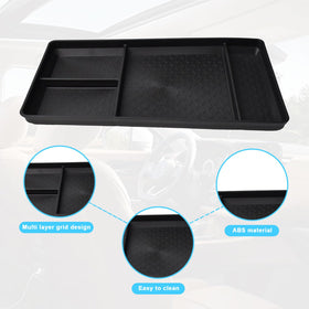 EDBETOS compartment detail with phones and coins for organized storage