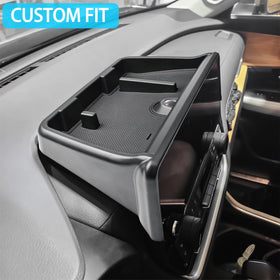 EDBETOS compartments loaded with sunglasses tissues and coins showing organized convenience